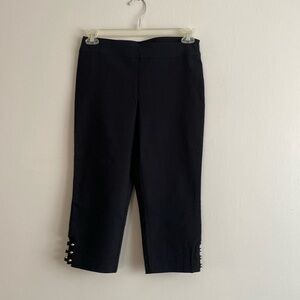 Black, stretchy, knee-length trousers with decorations at the bottom, size PM